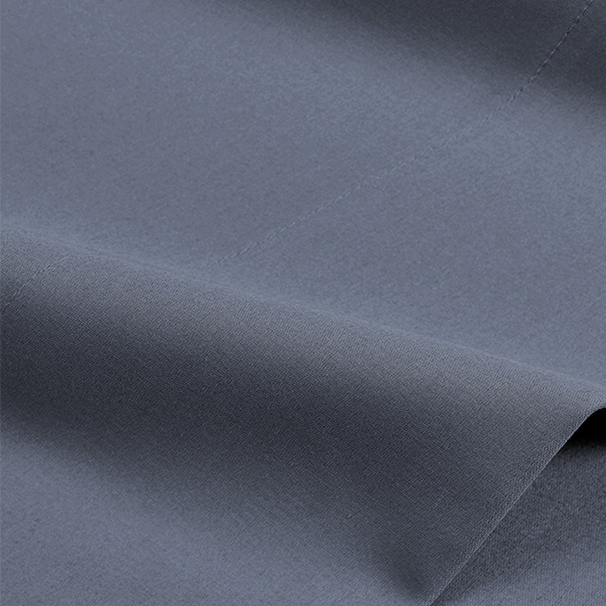 Close-up of smooth, mineral blue 1000 thread count cotton sateen sheet fabric for luxury bedding.