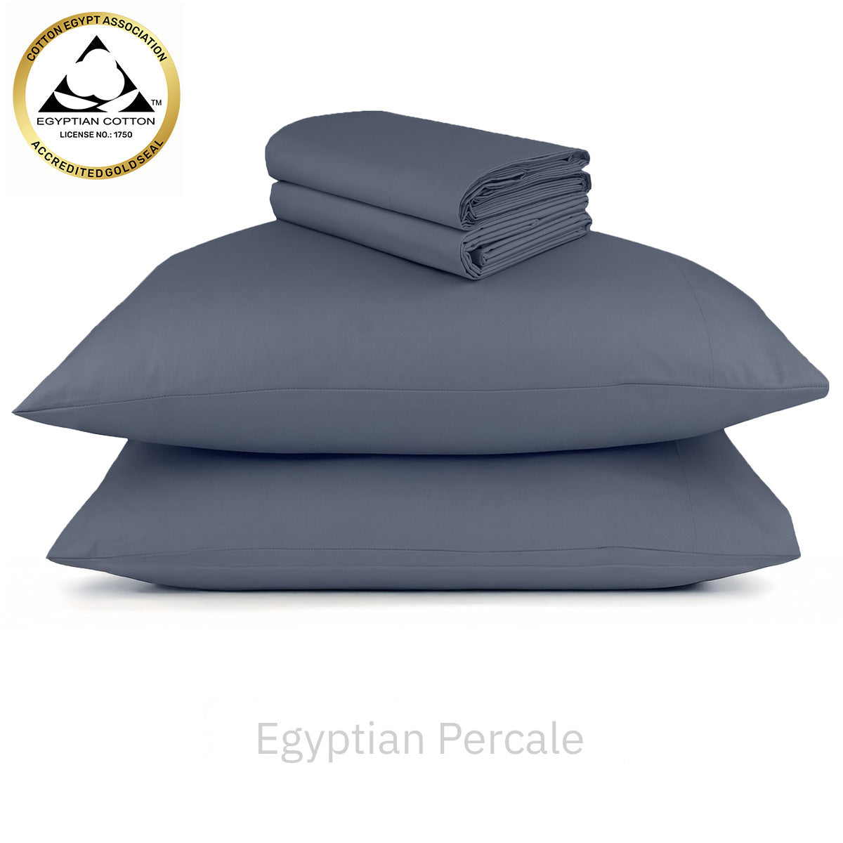 Made bed with smooth, dark blue 1000 thread count cotton sateen sheet set with a tufted headboard.