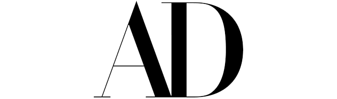 Logo of Architectural Digest (AD) magazine in thin, elegant serif font style on a white background.